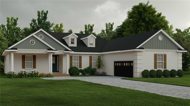 view of front of house with a front lawn and a garage