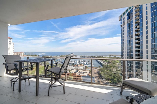 balcony featuring a water view