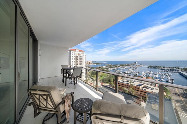 balcony featuring a water view