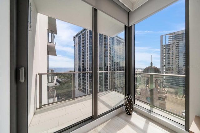 balcony featuring a water view