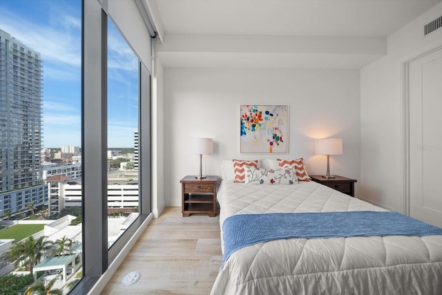 bedroom with light hardwood / wood-style floors