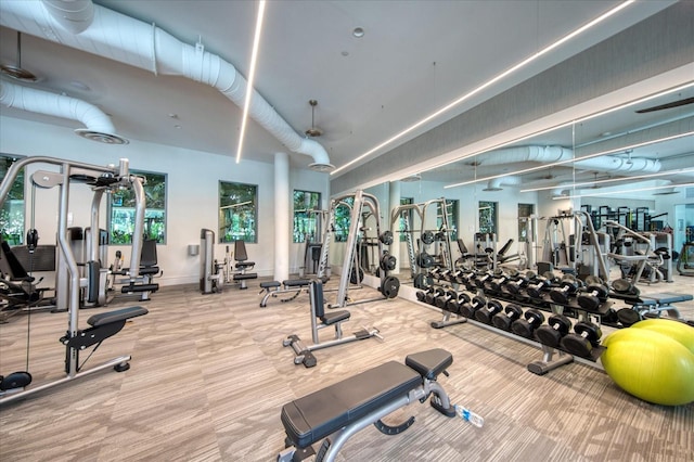 exercise room featuring ceiling fan