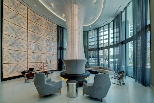 100 1st Ave N Unit 1601, Saint Petersburg, FL 33701 - building lobby featuring floor to ceiling windows and a towering ceiling