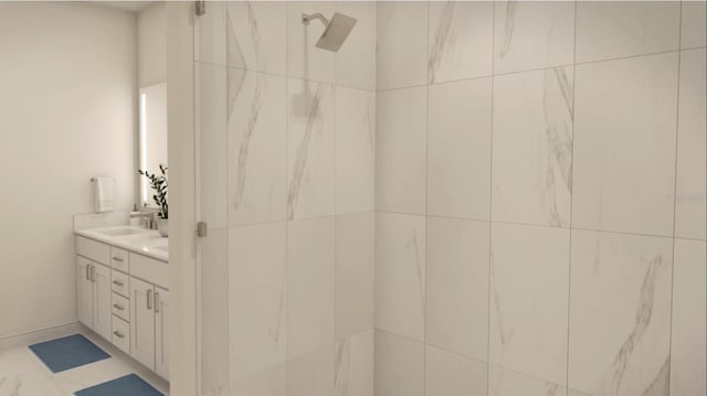 bathroom featuring vanity and a tile shower