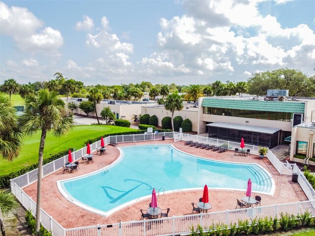 view of swimming pool featuring a patio area