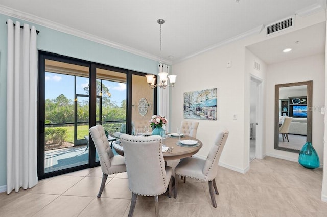 dining area featuring an inviting chandelier, ornamental molding, and light tile patterned flooring