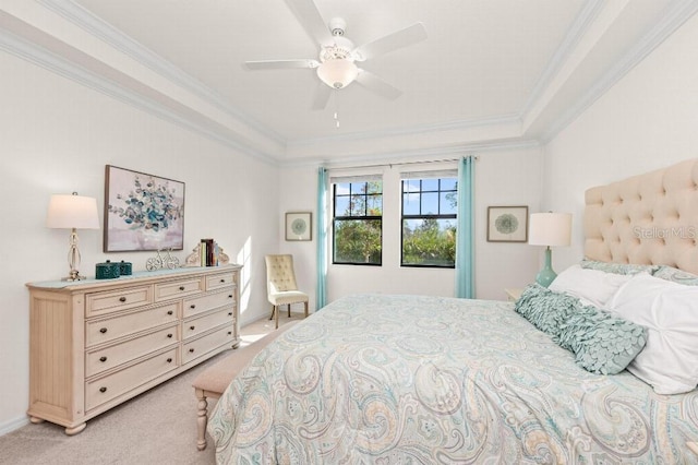 bedroom featuring light carpet, ceiling fan, and crown molding