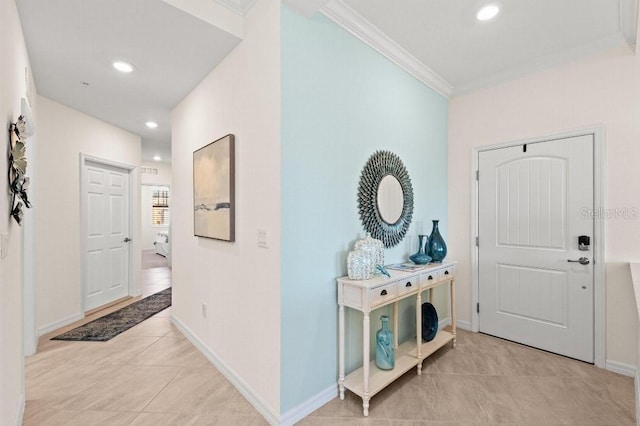 tiled entryway with crown molding