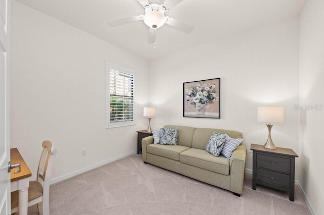 living room with ceiling fan and light carpet