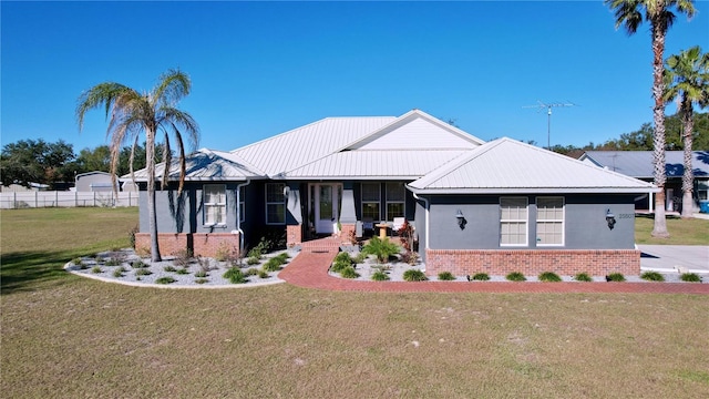 view of front facade featuring a front lawn