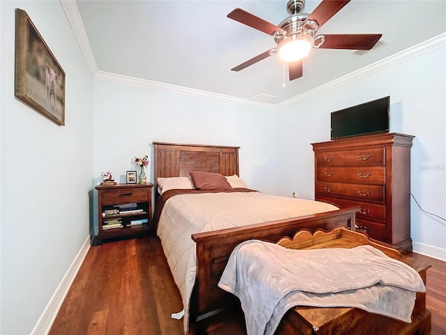 bedroom featuring dark hardwood / wood-style flooring, ceiling fan, and crown molding