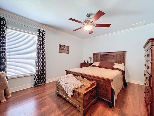 bedroom with ceiling fan, dark hardwood / wood-style flooring, crown molding, and multiple windows