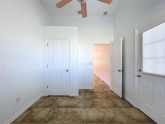 unfurnished bedroom with ceiling fan