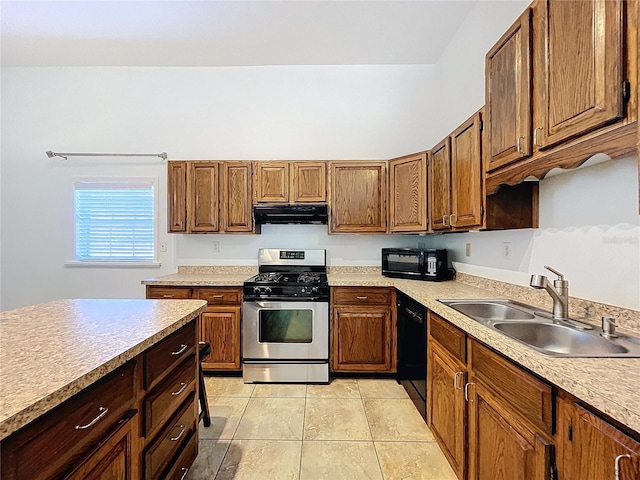 kitchen featuring light tile patterned floors, sink, and black appliances