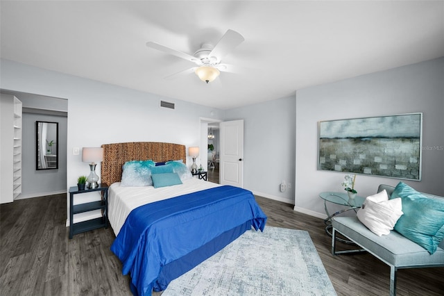 bedroom with ceiling fan and dark hardwood / wood-style flooring