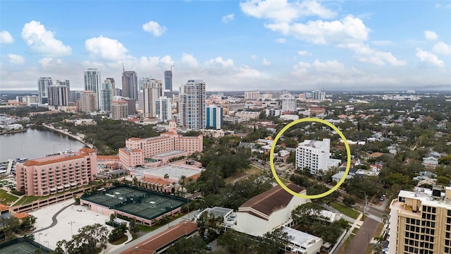 bird's eye view featuring a view of city and a water view