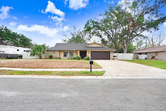 ranch-style home with a garage