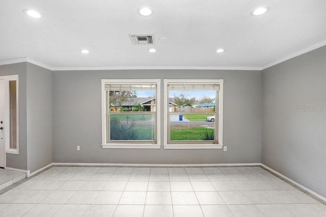 empty room featuring ornamental molding