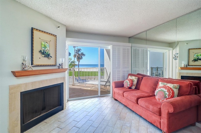 living room with a textured ceiling