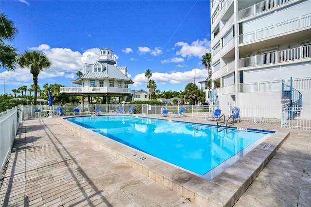 view of swimming pool featuring a patio