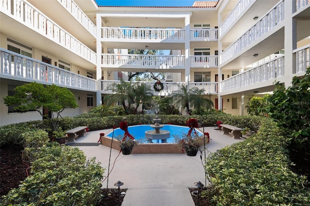 view of pool featuring a patio