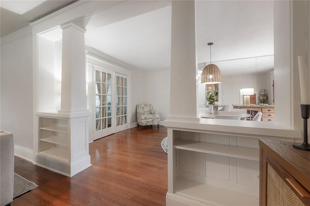 kitchen with decorative light fixtures and dark hardwood / wood-style floors