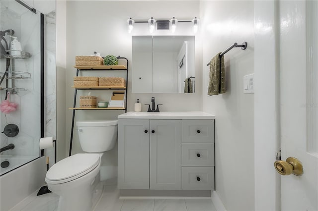 full bathroom featuring tile patterned flooring, bath / shower combo with glass door, vanity, and toilet