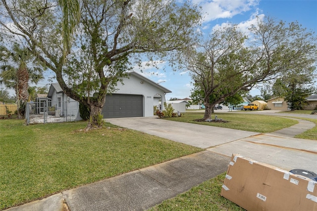 view of side of home featuring a garage and a yard