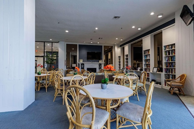 dining space with carpet