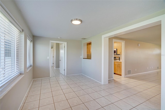 view of tiled spare room