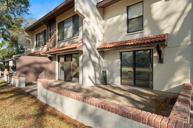 back of house featuring a patio