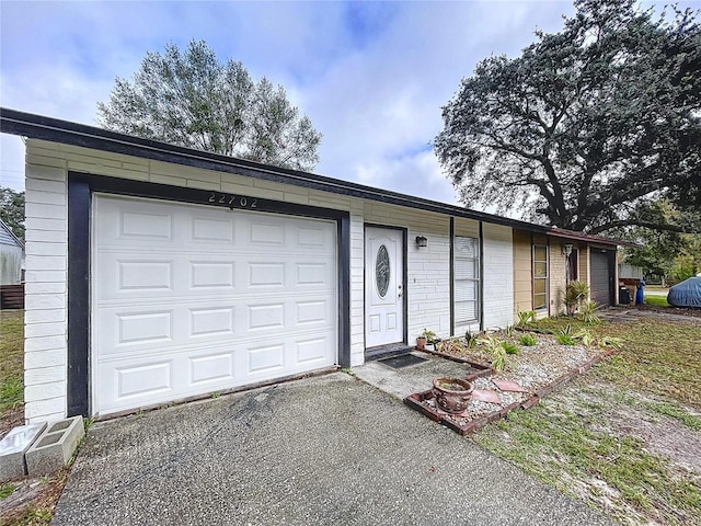 ranch-style house with a garage