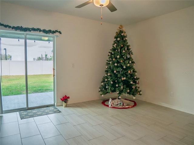 interior space featuring ceiling fan