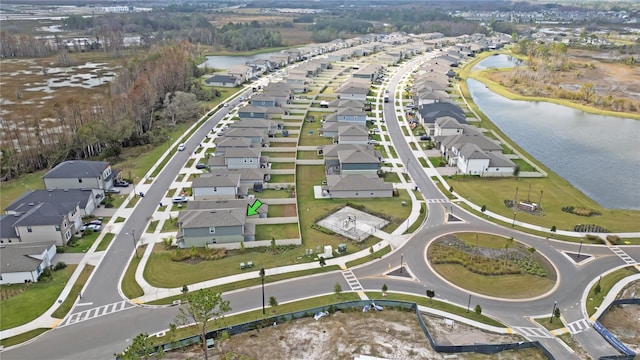 bird's eye view with a water view