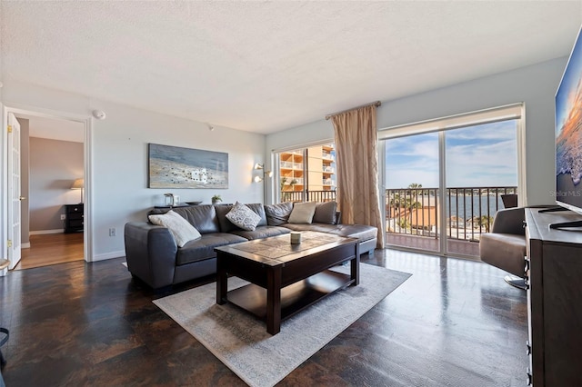 living room with a textured ceiling