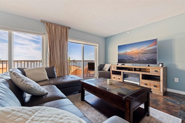 living room with a textured ceiling