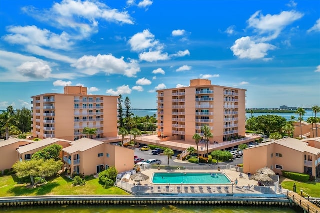 view of building exterior featuring a water view