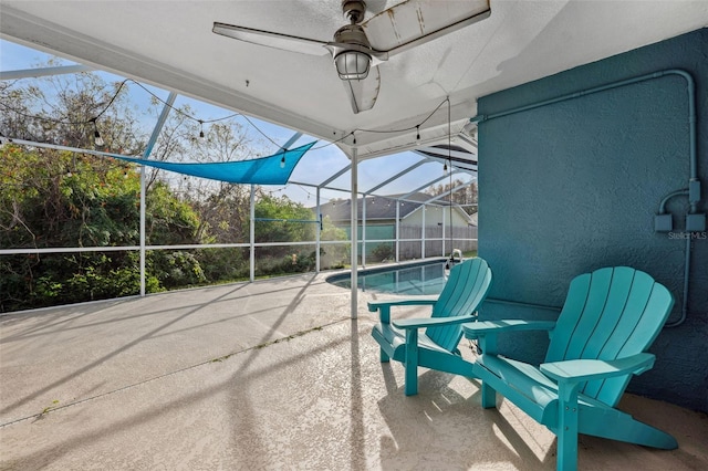 view of patio with a lanai