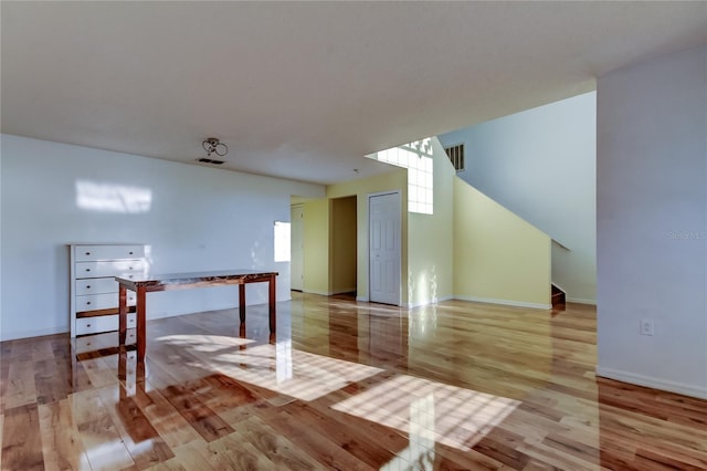 spare room featuring light hardwood / wood-style flooring