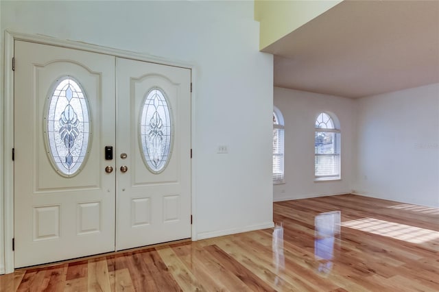 entrance foyer with light wood-type flooring