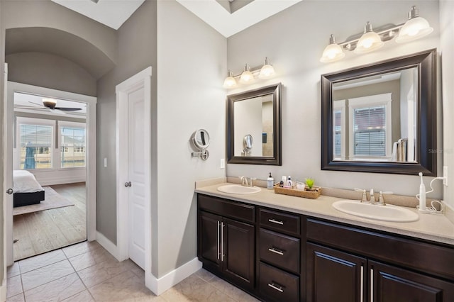 bathroom with vanity and ceiling fan