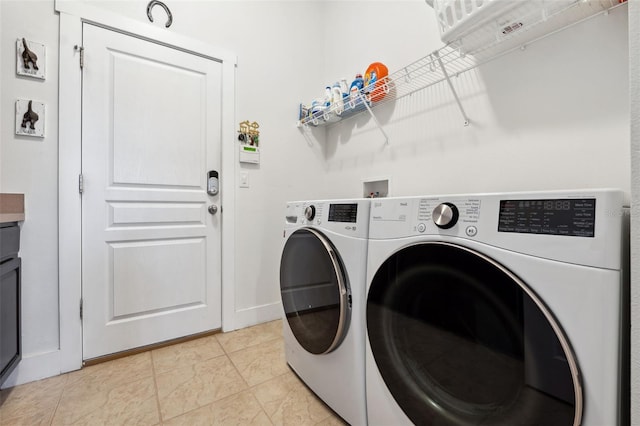 laundry area featuring separate washer and dryer