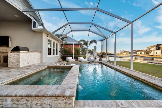 view of swimming pool featuring a patio, area for grilling, pool water feature, a lanai, and a water view