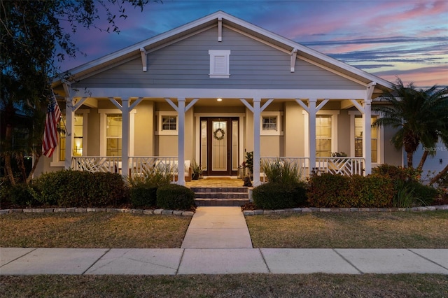 bungalow-style house featuring covered porch