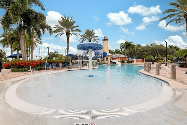 view of pool featuring sink and pool water feature