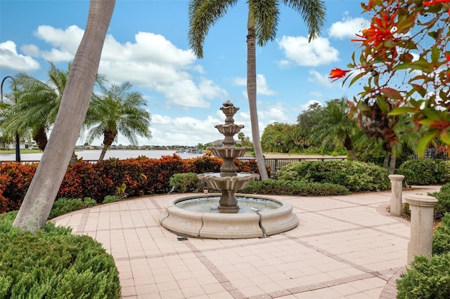 view of patio featuring a water view