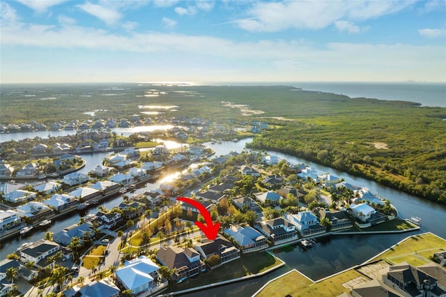 aerial view with a residential view and a water view