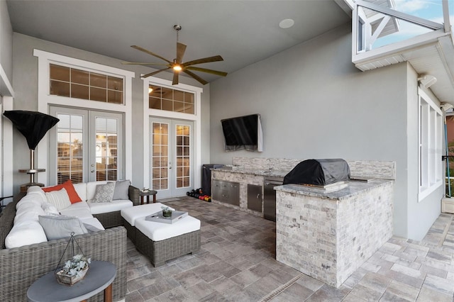 view of patio with area for grilling, a ceiling fan, french doors, a grill, and an outdoor hangout area