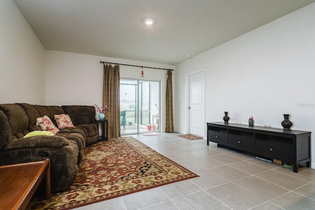 living room featuring light tile patterned flooring