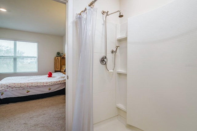 bathroom featuring a shower with shower curtain